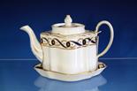 A New Hall porcelain teapot circa 1789, silver shape, blue and gilt swag and foliate decoration,