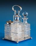 A Channel Islands silver cruet stand Bruce Russell, Guernsey 1981, square base on ball supports,