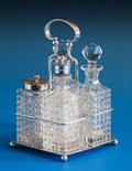 A Channel Islands silver cruet stand Bruce Russell, Guernsey 1981, square base on ball supports,