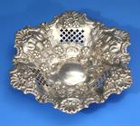 An Edwardian silver bon-bon dish Barker Brothers, Birmingham 1904, of hexagonal form, with pierced