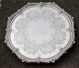 A Victorian silver salver Richard Martin and Ebenezer Hall, London 1887, the uprising scalloped