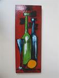 A ceramic tile, bottles still life, indistinctly signed, 18cm x 48cm