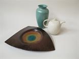 A Poole vase, Hornsea teapot and studio pottery dish