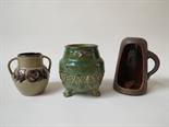 A Swedish ceramic footed vase, candle holder and signed Upsala Ekeby vase