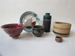 A box of assorted studio ceramics including mirror, bowls and vase.  Impressed seals to some