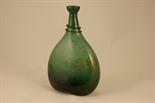 Continental green glass bottle, 19th Century or earlier, flattened ovoid form with applied serpent