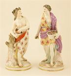 Pair of Continental porcelain figures representing `Summer` and `Autumn`, 19th Century, modelled as