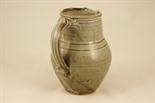 St Ives stoneware jug, ovoid form decorated with a grey and speckled brown glaze, impressed St.