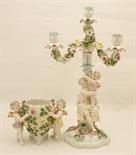 Sitzendorf candelabrum, having four floral encrusted branches supported by a figural column modelled
