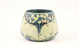 Moorcroft `violets` posy bowl, circa 1900-13, having tapered sides decorated with yellow headed