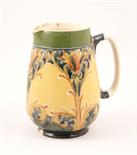 Macintyre & Co. Dura water jug, circa 1905-13, decorated with a Florian design of a downy thistle
