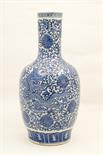 Chinese blue and white bottle vase, ovoid form with a cylinder neck, decorated with dragons,