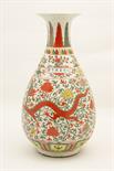 Chinese doucai vase, ovoid form with trumpet neck, decorated with a terracotta dragon flying