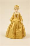 Royal Worcester figure `Grandmother`s Dress`, circa 1959, modelled by F G Doughty, decorated in