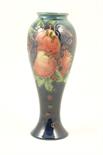 Moorcroft Finch pattern vase, slender inverted baluster form decorated with birds and fruits in