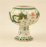 Chinese stem bowl, decorated with a scrolling dragon chasing a flaming pearl, in green enamels