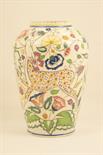 Poole vase designed by Truda Carter, decorated with an all over design of a deer strolling amidst