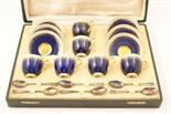 Royal Worcester coffee service, circa 1919, deep blue ground with gilt and white enamelled `