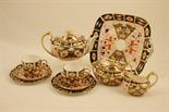 Royal Crown Derby tea for two service, circa 1923-34, decorated in pattern 2451 in Imari colours and