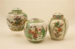 Chinese ginger jar and cover, decorated with parrots perched on a basket of flowers in famille