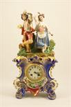 French porcelain mantel clock, circa 1880, surmounted with a figure group of peasant dancers and