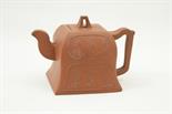 Chinese Yixing teapot, of square section moulded with characters at one side, with seal mark to