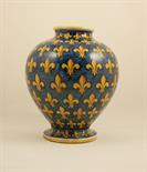 Italian maiolica jar, possibly Deruta, baluster form decorated with fleurs-de-lys in yellow