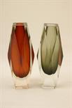 Murano `Sommerso` faceted cased red glass vase, height 21cm, also a similar green/grey encased glass