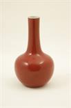 Chinese monochrome bottle vase, decorated with an all over red glaze, gilt rim, turquoise interior