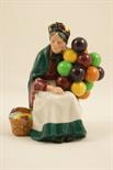 Royal Doulton figure `The Old Balloon Seller` HN1315, designed by L Harradine, issued 1929-1998,