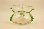 Attributed to James Powell, a free blown glass bowl, squat bun form with everted rim and decorated