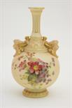 Royal Worcester peach ground bottle vase, circa 1901, decorated with polychrome and gilt flowers