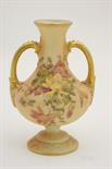 Royal Worcester peach ground small vase, circa 1918, twin handled baluster form decorated with