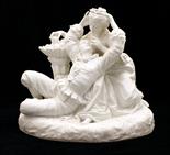 Continental bisque figure group `The fruits of love`, late 19th Century, well modelled as a couple