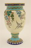 Longwy art pottery vase, decorated in the Emaux de Longwy style, the wide necked ovoid body