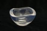 Orrefors small heavy glass bowl with wavy rim and tinted with light blue, engraved mark, 12.5cm