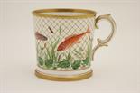 Unusual well decorated English china tankard, probably Coalport, circa 1840, decorated with fishes