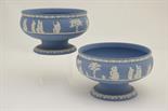 Pair of Wedgwood light blue jasper ware bowls, each decorated with a band of classical figures above