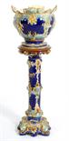 Victorian majolica jardiniere on stand, circa 1890, moulded throughout in Rococo style with C-