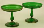 Pair of Victorian green glass tazze, having gilt keyed decoration to the outer bowl, slender