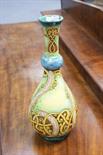 Della Robbia bottle vase by Cassandra Annie Walker, dated 1904, incised with Celtic knot style