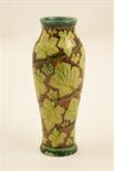 Della Robbia vase by Charles Collis, circa 1895, slender ovoid form decorated with an entwining vine