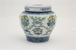 Chinese doucai vase, with an associated cover, baluster form decorated with a central band of