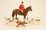 Beswick huntsman and hounds group comprising Huntsman, model no. 1501, style two, designed by