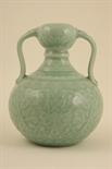 Chinese celadon vase, 20th Century, globular form with twin handles to the neck, carved with lotus