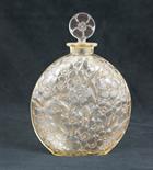 Lalique Marguerites perfume bottle, moulded on one side with flowers and with moulded flower