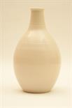 Poole studio vase, ovoid form with short neck and decorated in a plain mushroom glaze, 25cm