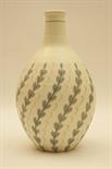 Poole vase designed by Alfred Read, circa 1954, shape 691, painted with stylised leaf fronds against