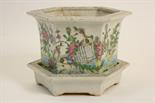 Chinese famille rose hexagonal jardiniere on stand, 19th Century, decorated with pheasants amongst