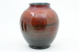 William Moorcroft flambe jar, circa 1920-35, ovoid form with slight horizontal ribbed moulding,